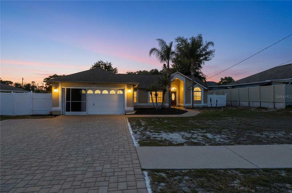 5277 Deltona Boulevard Spring Hill, FL 34606 - Photo 74 of 74 a house view with a garden space