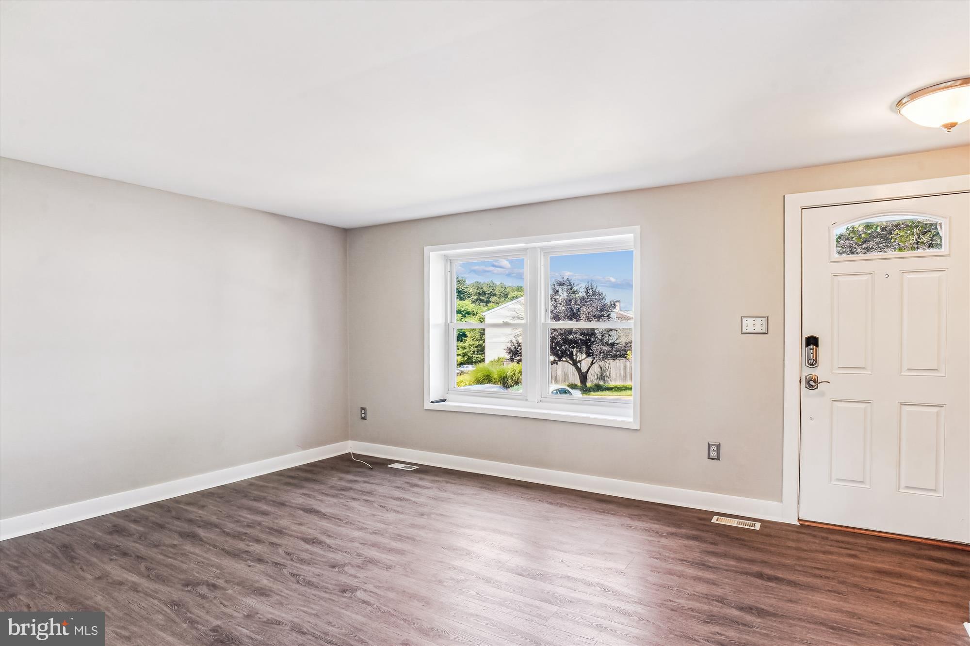 1708 Heather Lane Frederick, MD 21702 - Photo 11 of 47 an empty room with wooden floor and window