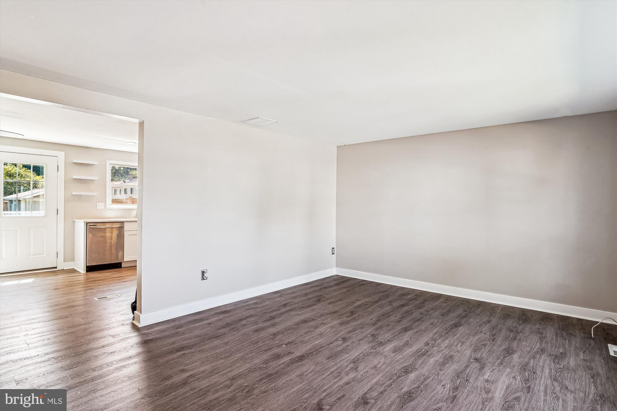 1708 Heather Lane Frederick, MD 21702 - Photo 12 of 47 a view of a room with wooden floor and white walls