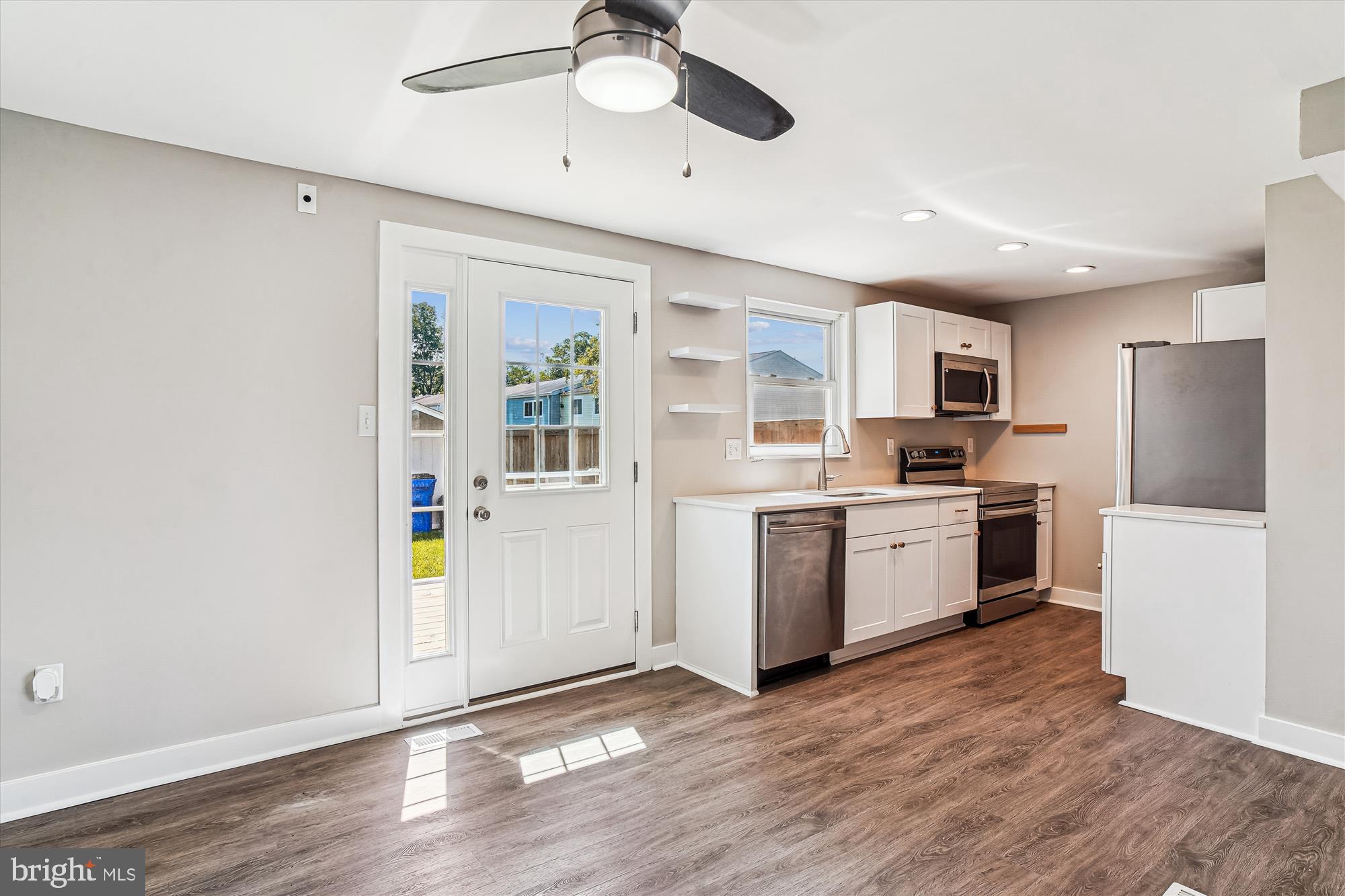 1708 Heather Lane Frederick, MD 21702 - Photo 14 of 47 a kitchen with a refrigerator and a stove top oven