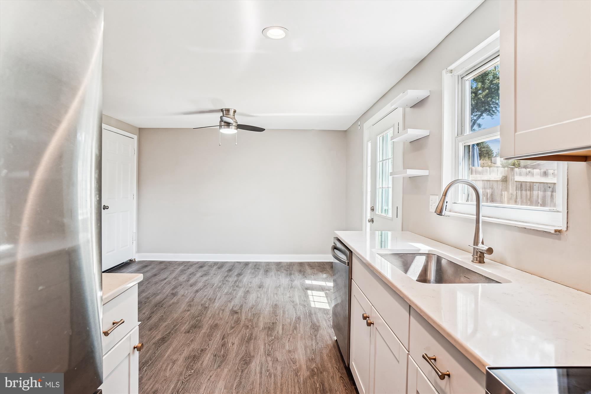 1708 Heather Lane Frederick, MD 21702 - Photo 18 of 47 a kitchen with a sink and wooden floor