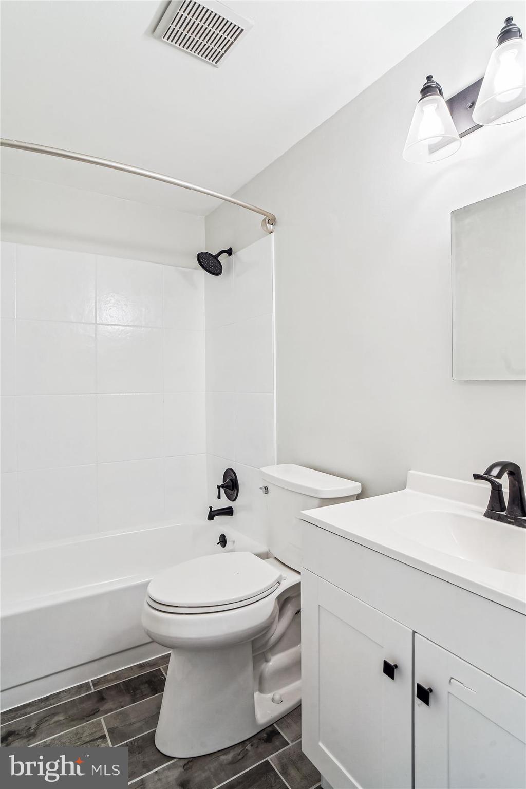 1708 Heather Lane Frederick, MD 21702 - Photo 20 of 47 a bathroom with a sink and a mirror