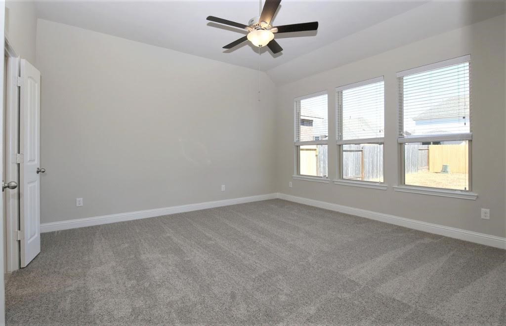 8202 Aleppo Pine Lane Cypress, TX 77433 - Photo 15 of 31 a view of an empty room with a window