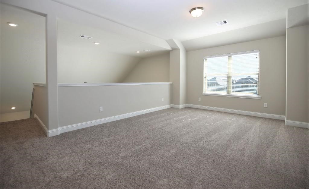 8202 Aleppo Pine Lane Cypress, TX 77433 - Photo 19 of 31 an empty room with windows