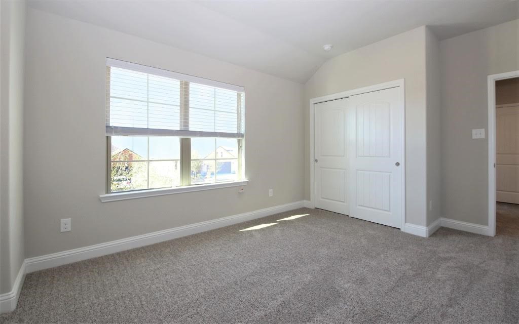 8202 Aleppo Pine Lane Cypress, TX 77433 - Photo 20 of 31 an empty room with a window