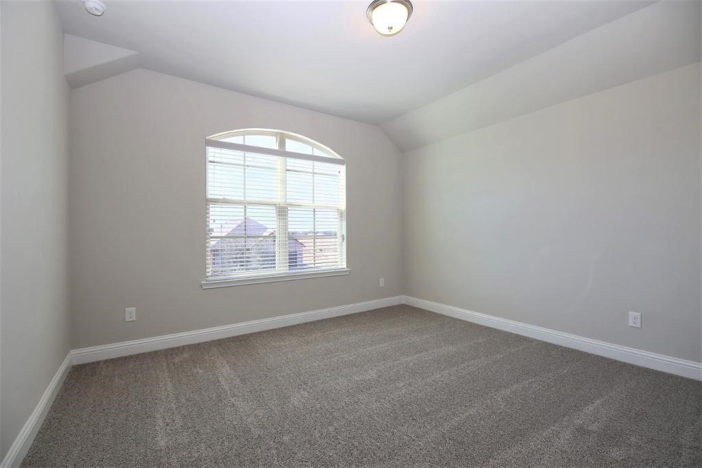 8202 Aleppo Pine Lane Cypress, TX 77433 - Photo 22 of 31 an empty room with a window