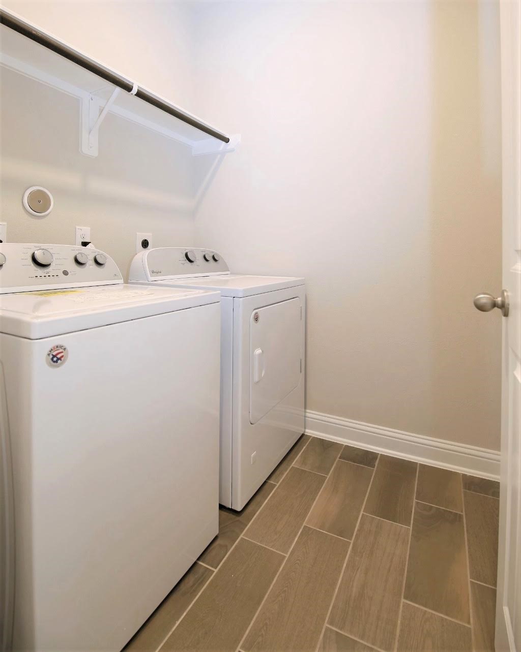 8202 Aleppo Pine Lane Cypress, TX 77433 - Photo 26 of 31 a utility room with dryer and washer