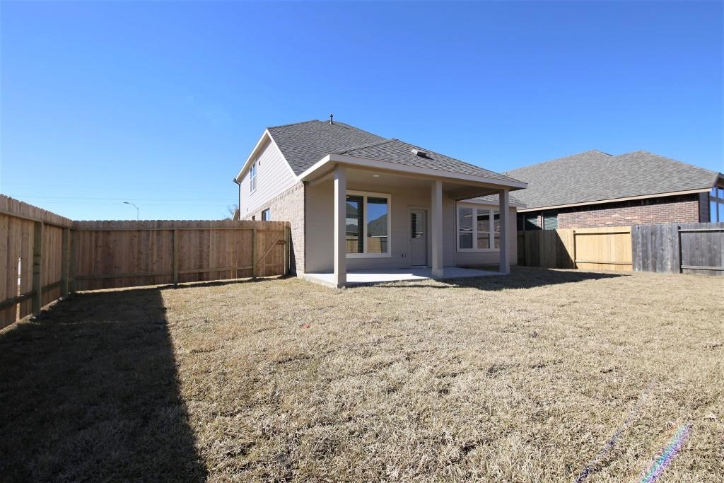 8202 Aleppo Pine Lane Cypress, TX 77433 - Photo 29 of 31 a view of a house with wooden fence