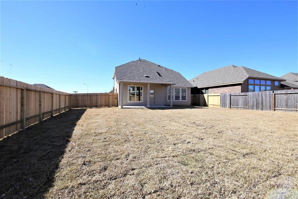 8202 Aleppo Pine Lane Cypress, TX 77433 - Photo 30 of 31 a front view of a house with a yard
