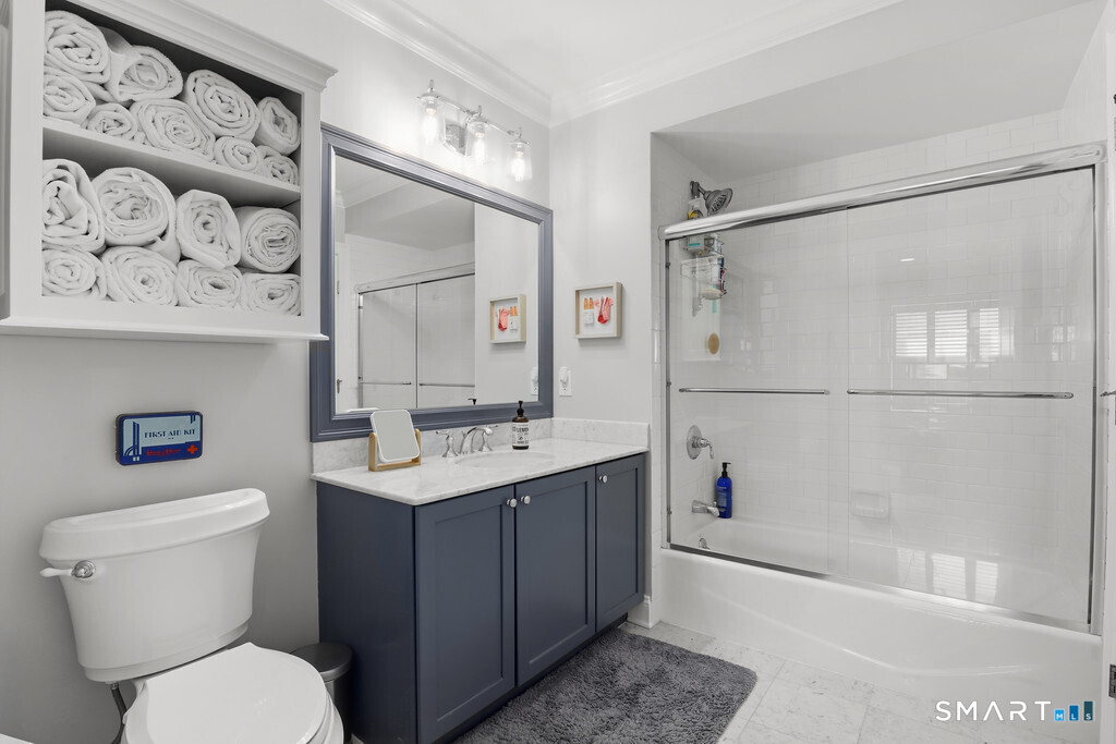 16 Hayestown Road, Unit D102 Danbury, CT 06811 - Photo 18 of 29 a bathroom with a sink toilet and shower