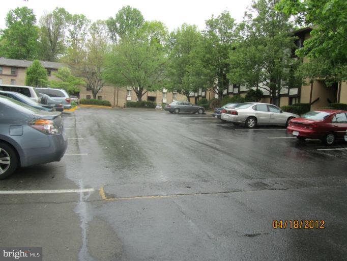 11633 Stoneview Square, Unit 81/12C Reston, VA 20191 - Photo 14 of 16 a view of cars parked on a street