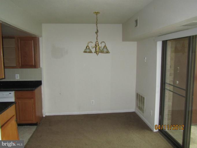 11633 Stoneview Square, Unit 81/12C Reston, VA 20191 - Photo 3 of 16 a view of a storage & utility room in a house