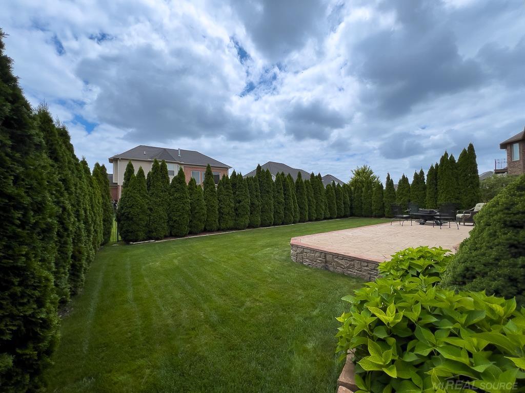 16070 Moore Park Road Macomb, MI 48044 - Photo 60 of 76 Plenty of quietness & privacy in the back yard.