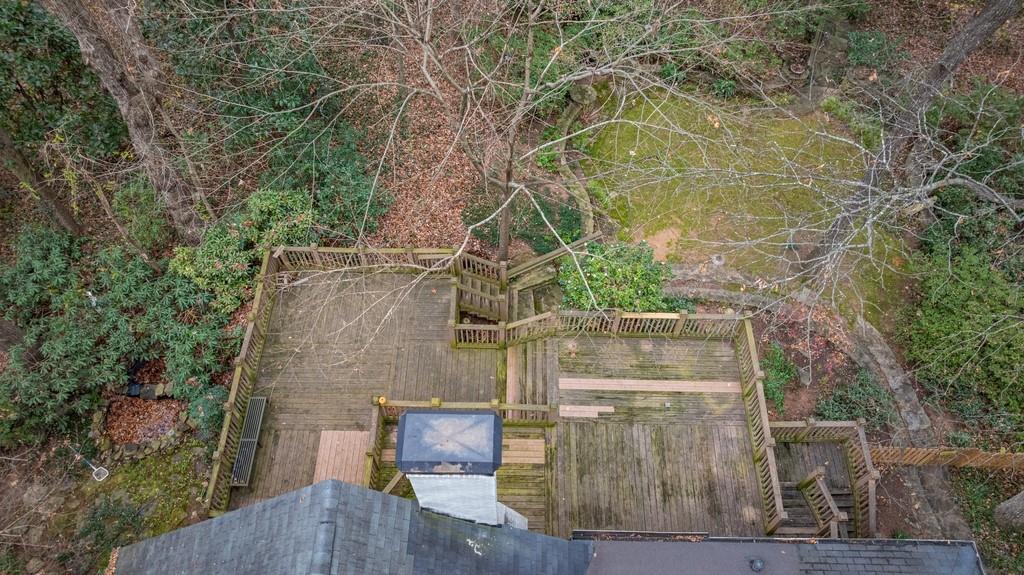 3990 Randall Mill Road Northwest Atlanta, GA 30327 - Photo 20 of 65 an aerial view of a house with a yard and wooden fence