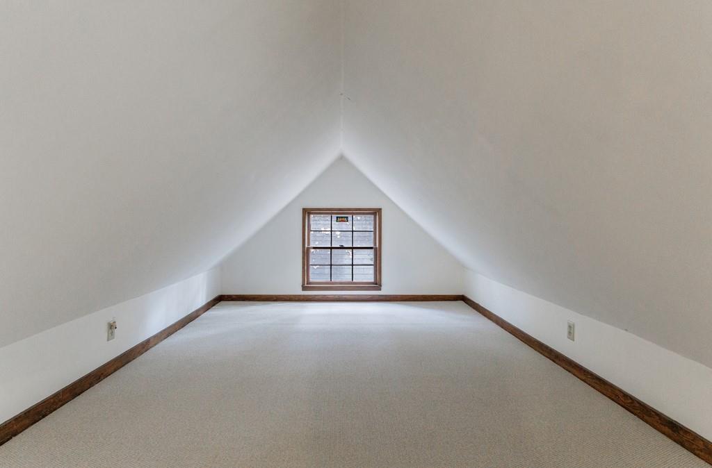 3990 Randall Mill Road Northwest Atlanta, GA 30327 - Photo 64 of 65 an empty room with windows and ceiling fan