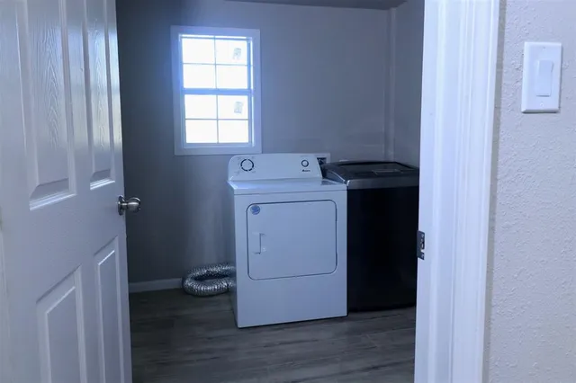 a utility room with dryer and washer