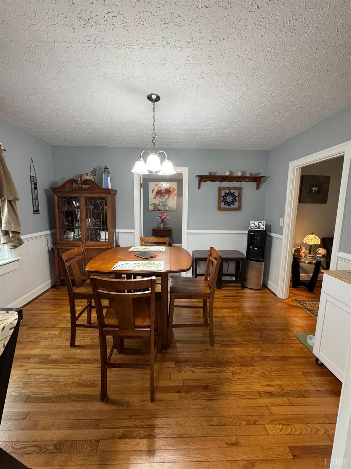 100 New Chapel Road Rustburg, VA 24588 - Photo 13 of 44 a view of a dining room with furniture