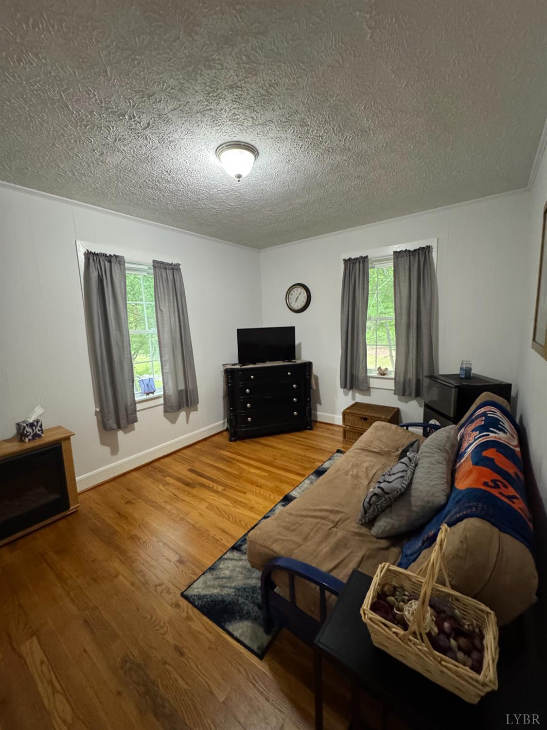 100 New Chapel Road Rustburg, VA 24588 - Photo 25 of 44 a bedroom with a bed and window