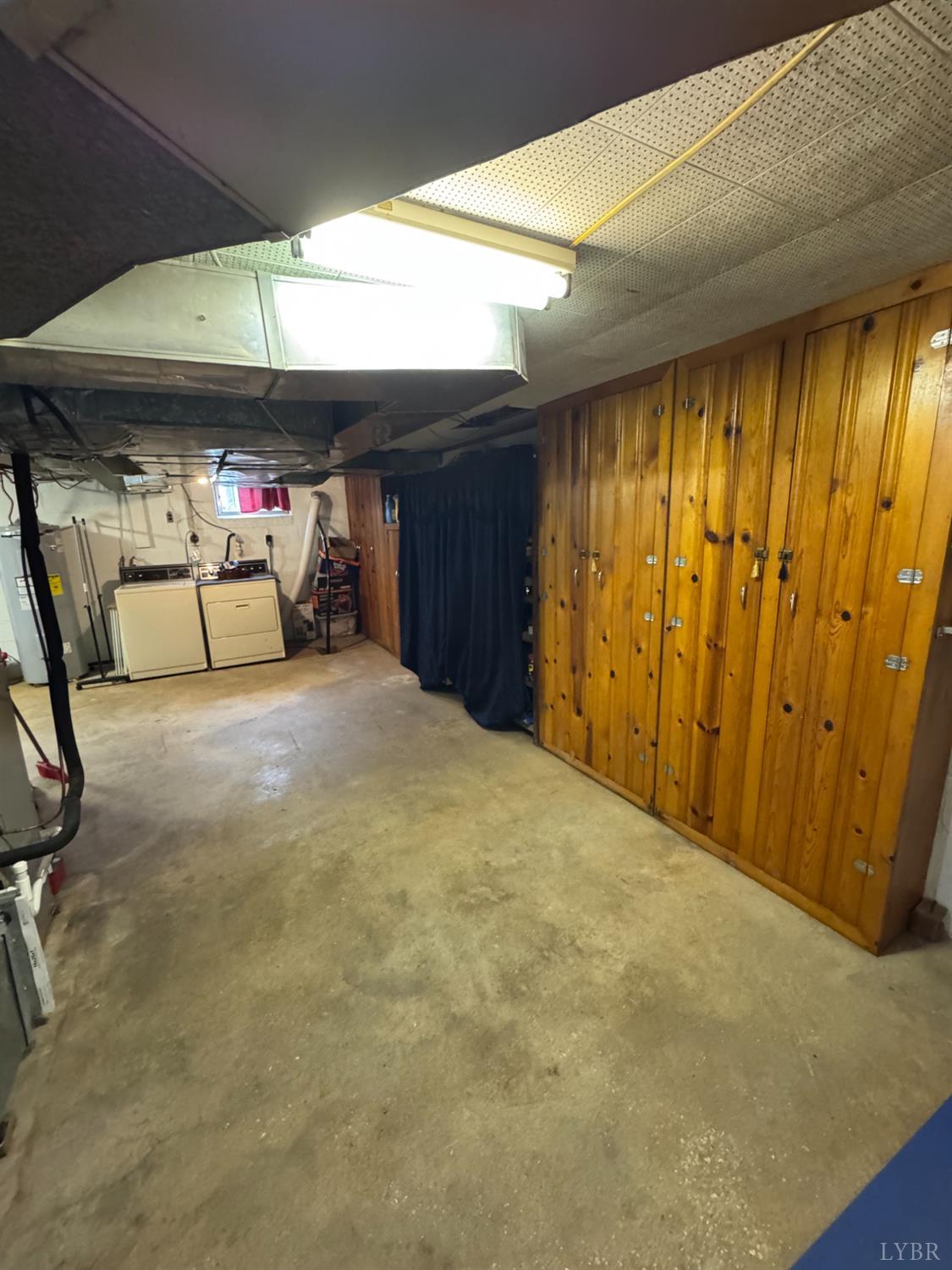 100 New Chapel Road Rustburg, VA 24588 - Photo 29 of 44 a view of a livingroom with furniture and a window