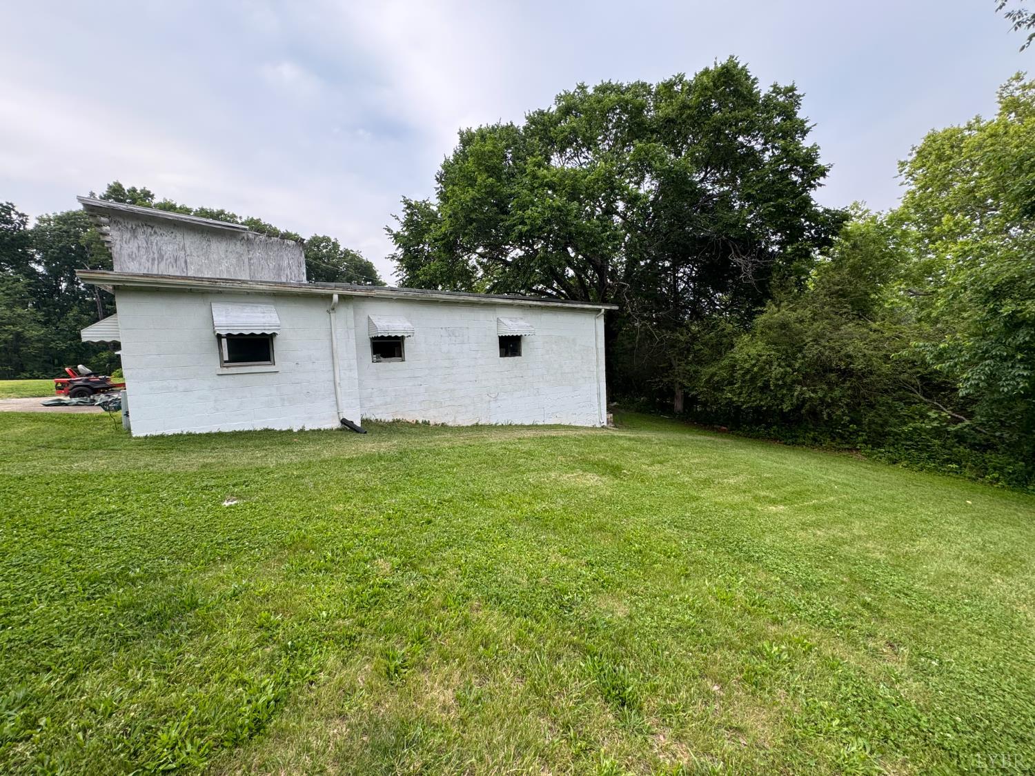 100 New Chapel Road Rustburg, VA 24588 - Photo 34 of 44 a front view of a house with garden