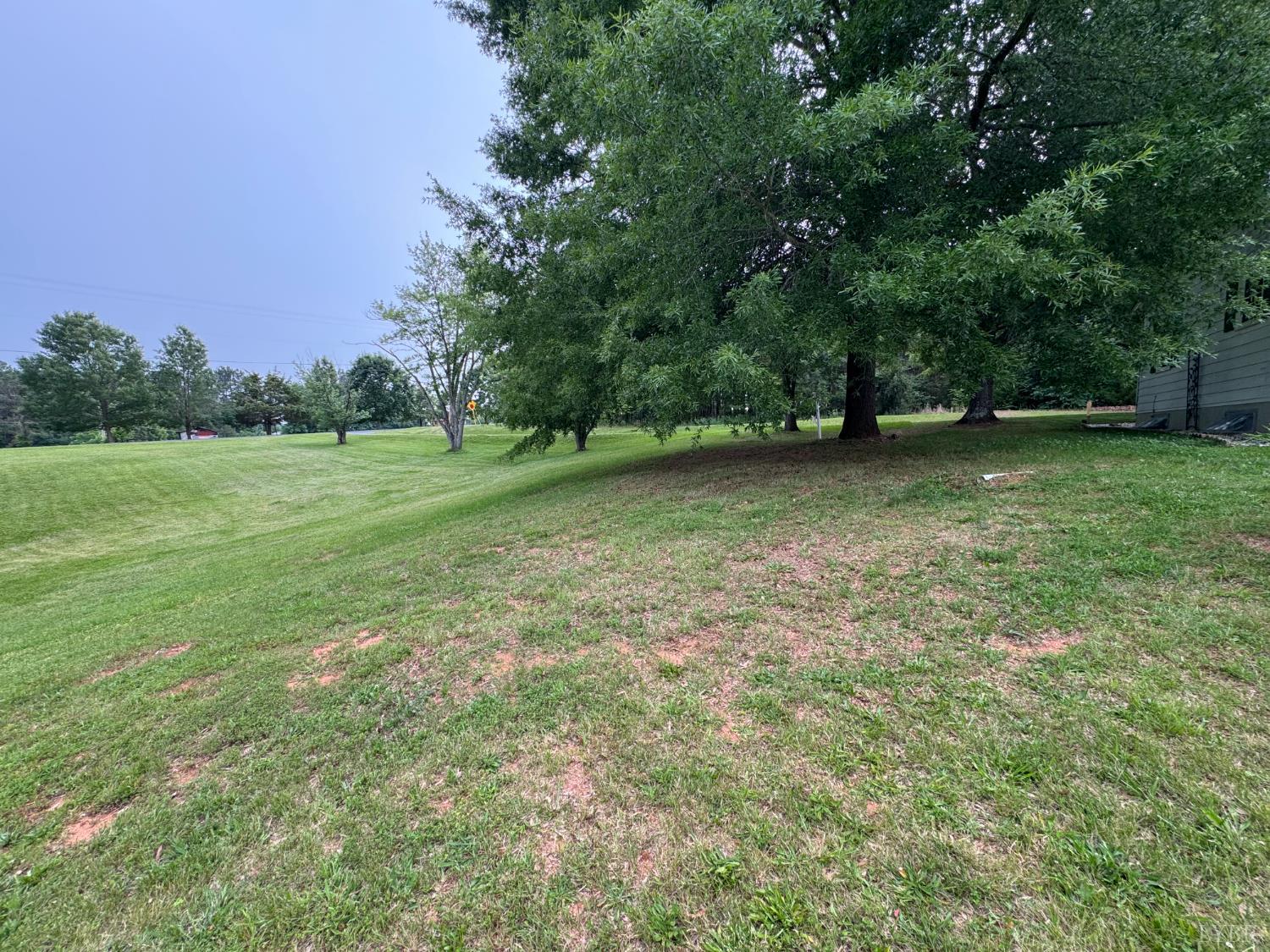 100 New Chapel Road Rustburg, VA 24588 - Photo 37 of 44 a view of a field with trees in the background