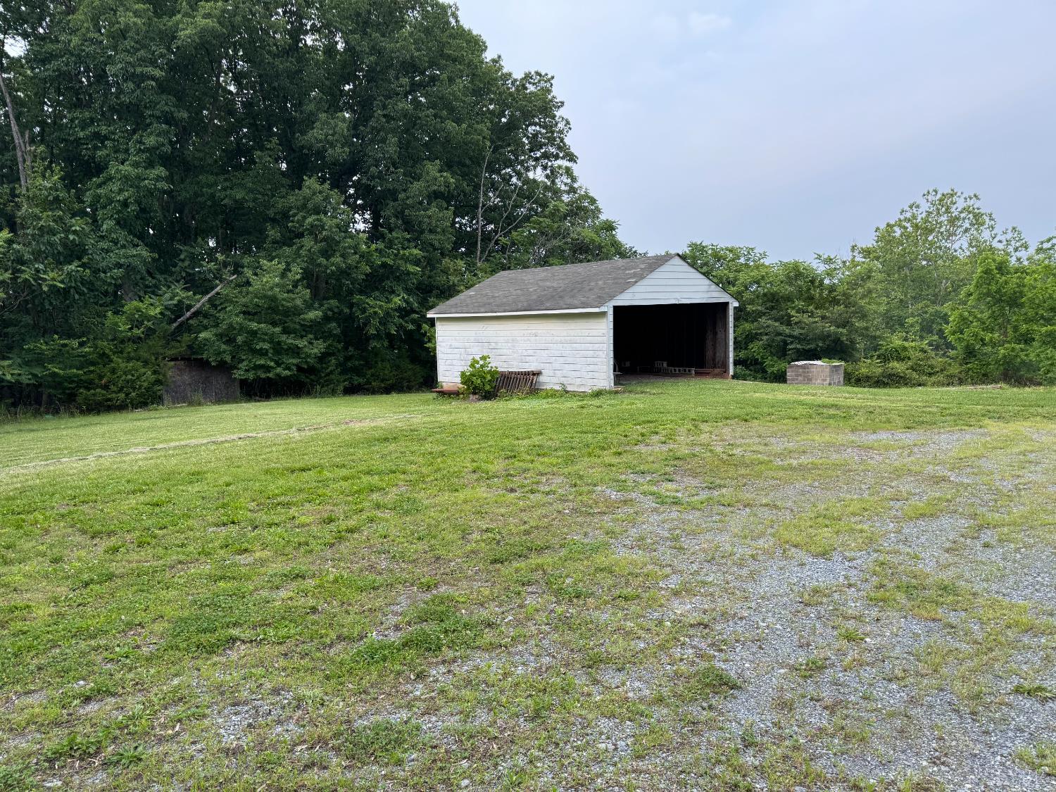 100 New Chapel Road Rustburg, VA 24588 - Photo 40 of 44 a house with a garden