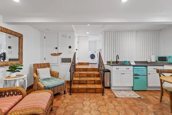 a bed room with a bed and furniture