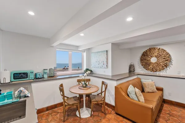 a living room with furniture and a table