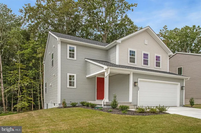 a front view of house with yard