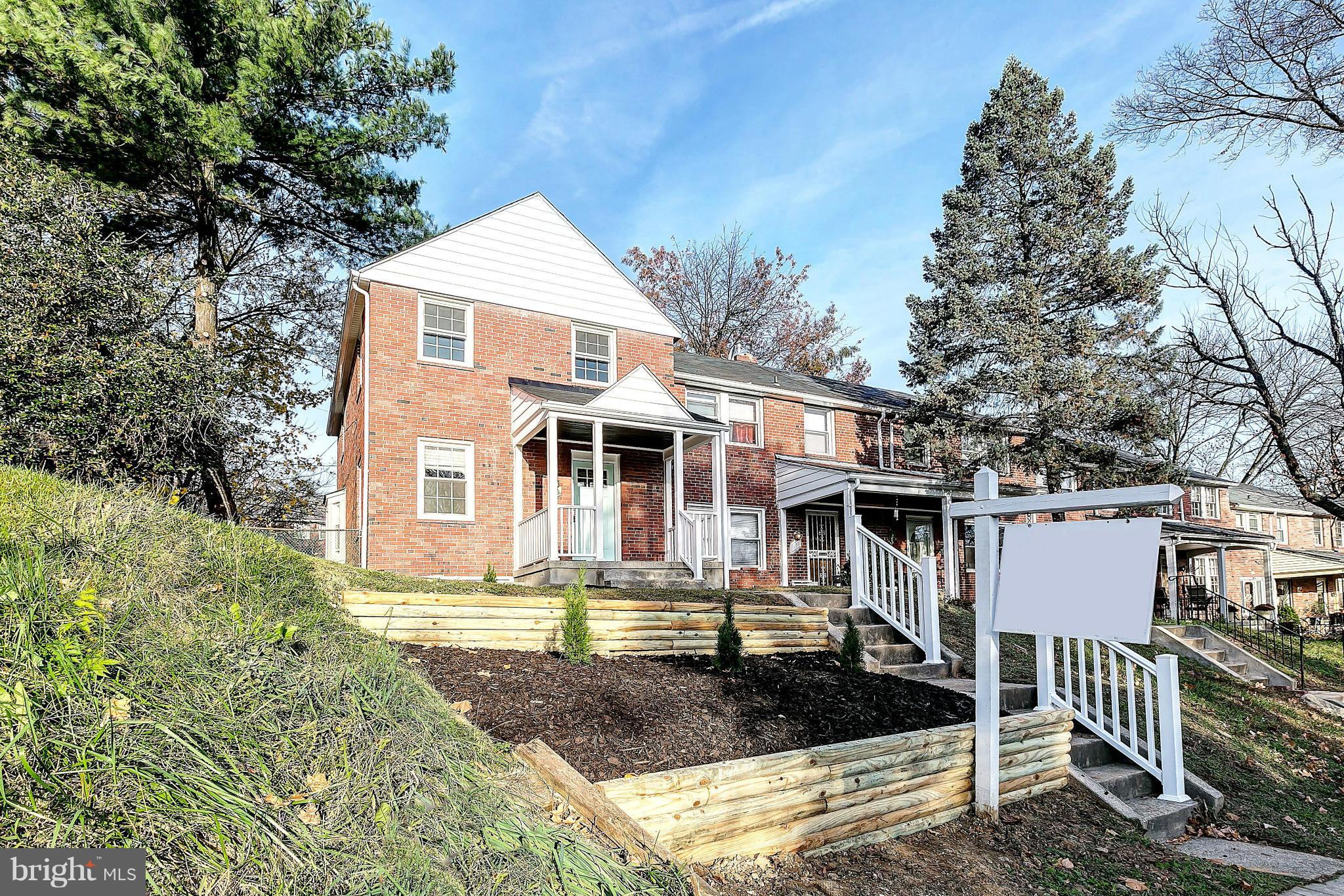 968 North Hill Road Baltimore, MD 21218 - Photo 29 of 29 a front view of a house with a yard