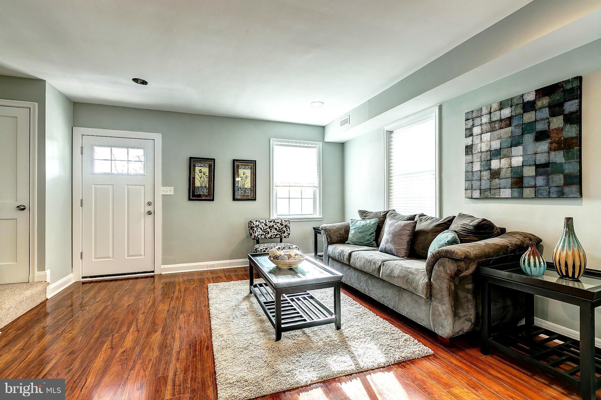 968 North Hill Road Baltimore, MD 21218 - Photo 5 of 29 a living room with furniture and a window
