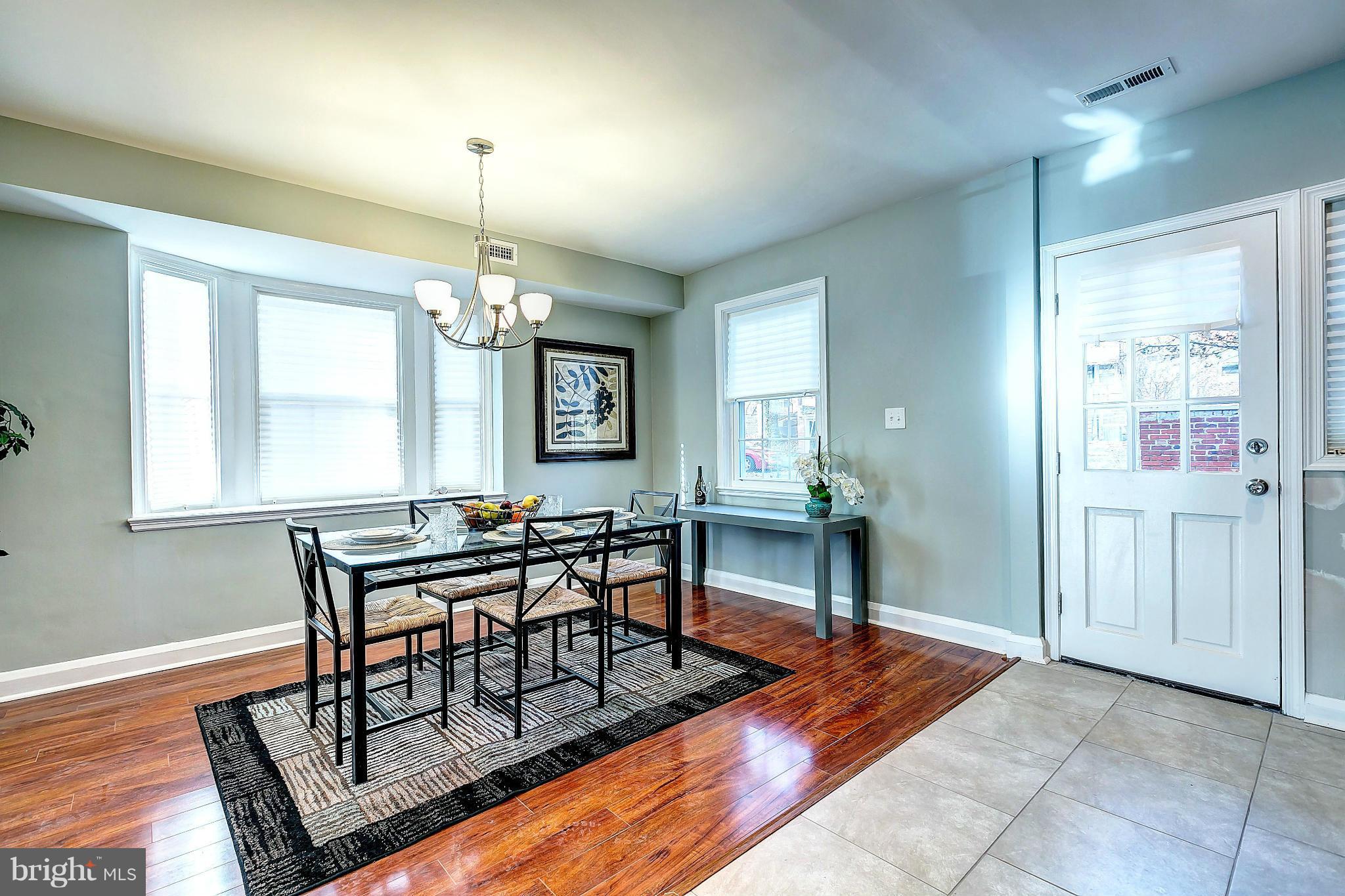 968 North Hill Road Baltimore, MD 21218 - Photo 10 of 29 a dining room with furniture and window