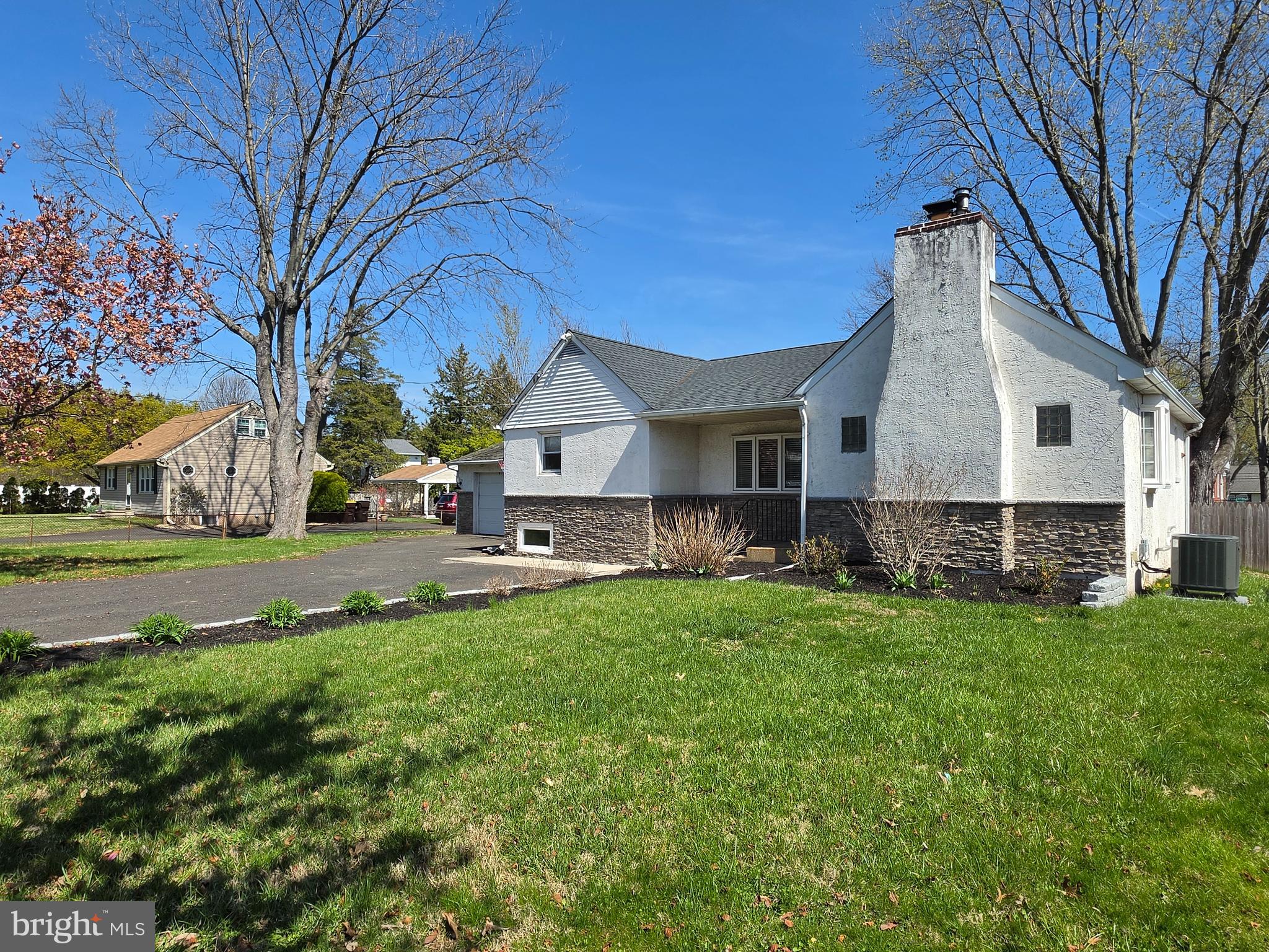 142 New Road Horsham, PA 19044 - Photo 2 of 38 a front view of a house with a yard