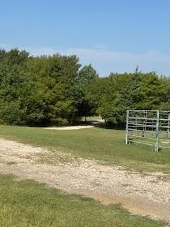 a view of a ocean with a nearby beach