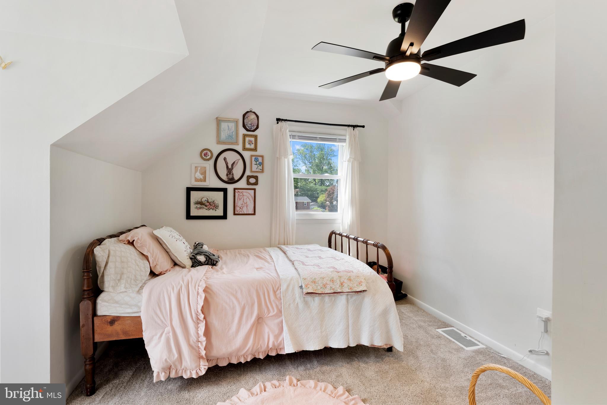 6222 Groveland Road Linthicum Heights, MD 21090 - Photo 27 of 40 a bedroom with a bed and ceiling fan