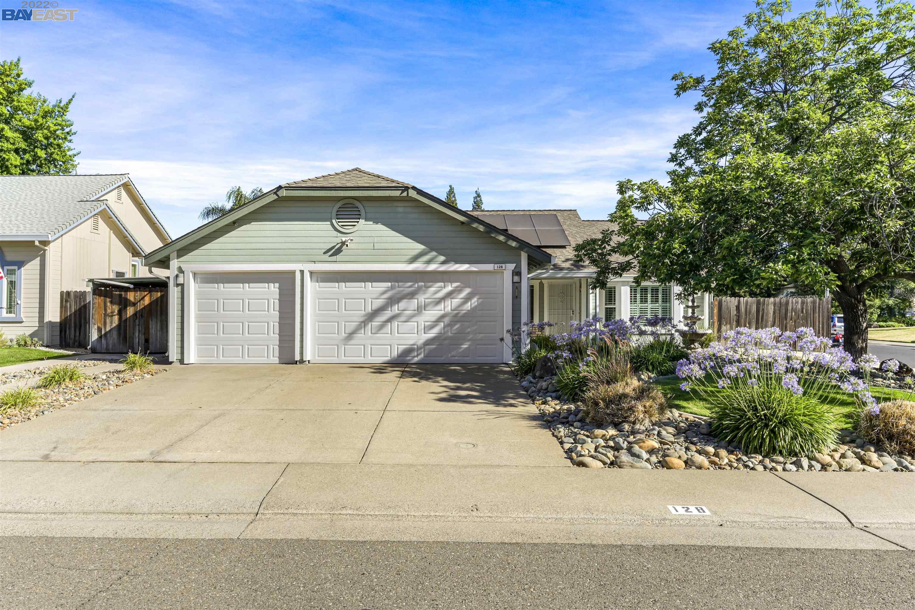 128 Bittercreek Drive Folsom, CA 95630 - Photo 1 of 1 a front view of a house with a yard