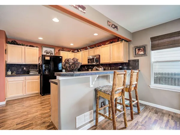 $440,000 | 2385 School House Drive, Milliken, CO 80543