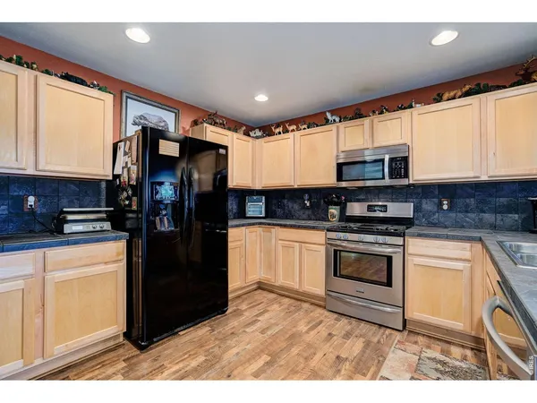 $440,000 | 2385 School House Drive, Milliken, CO 80543