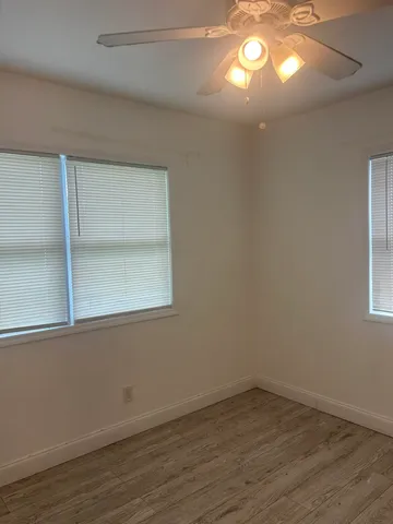 an empty room that has a window