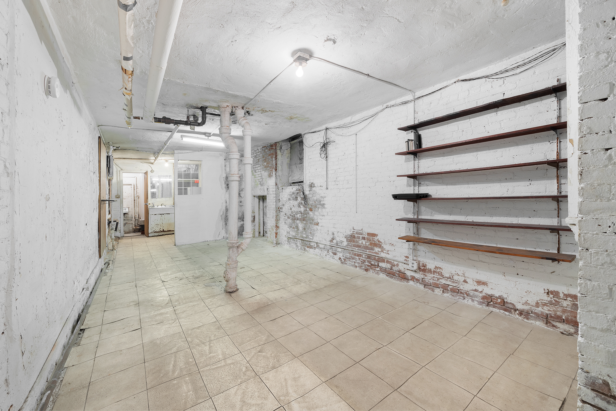 195 Prince Street, Unit 1LL Manhattan, NY 10012 - Photo 2 of 7 a view of empty room