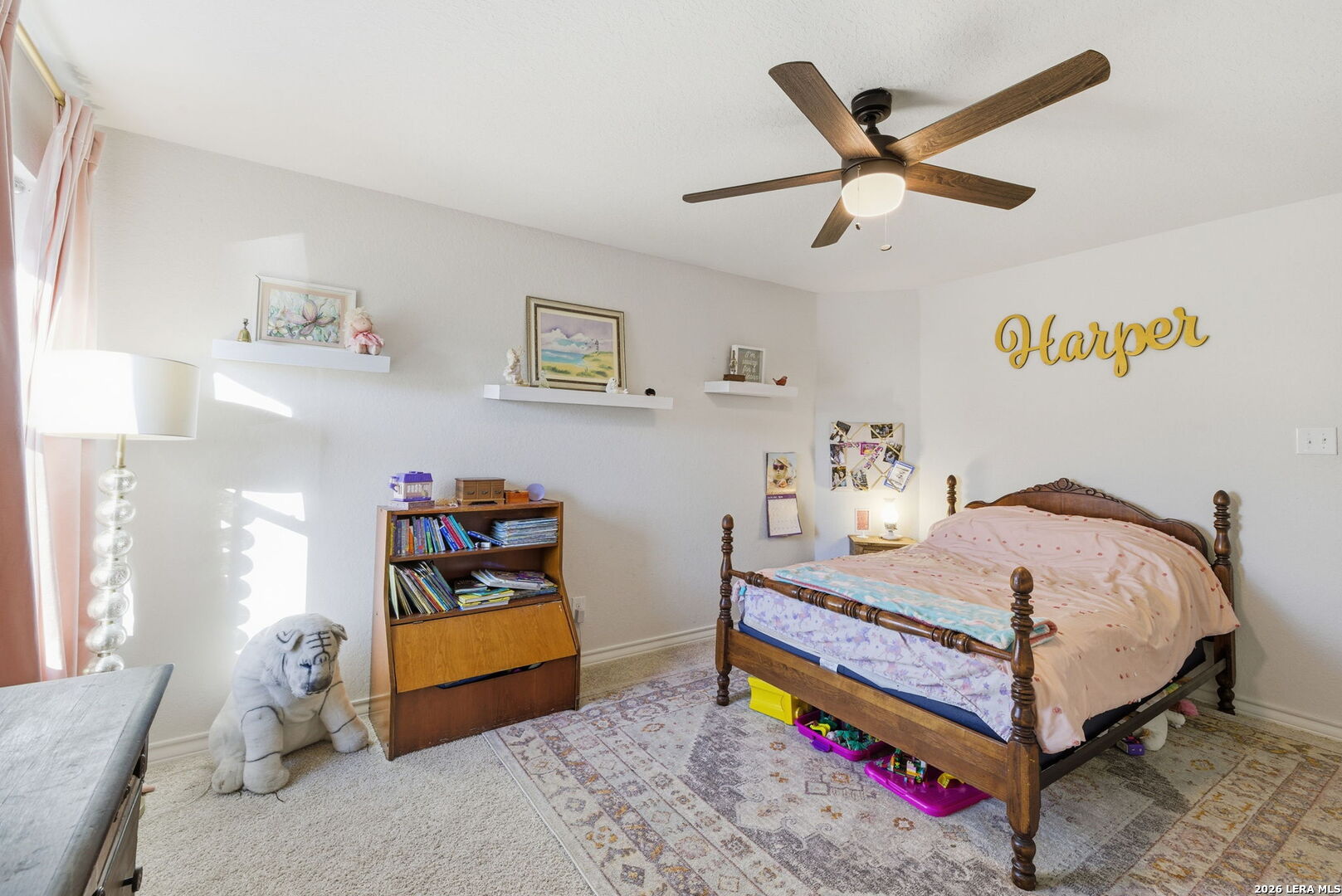 3410 Copper Acres Bulverde, TX 78163 - Photo 25 of 50 a bed room with a bed a window and a chandelier