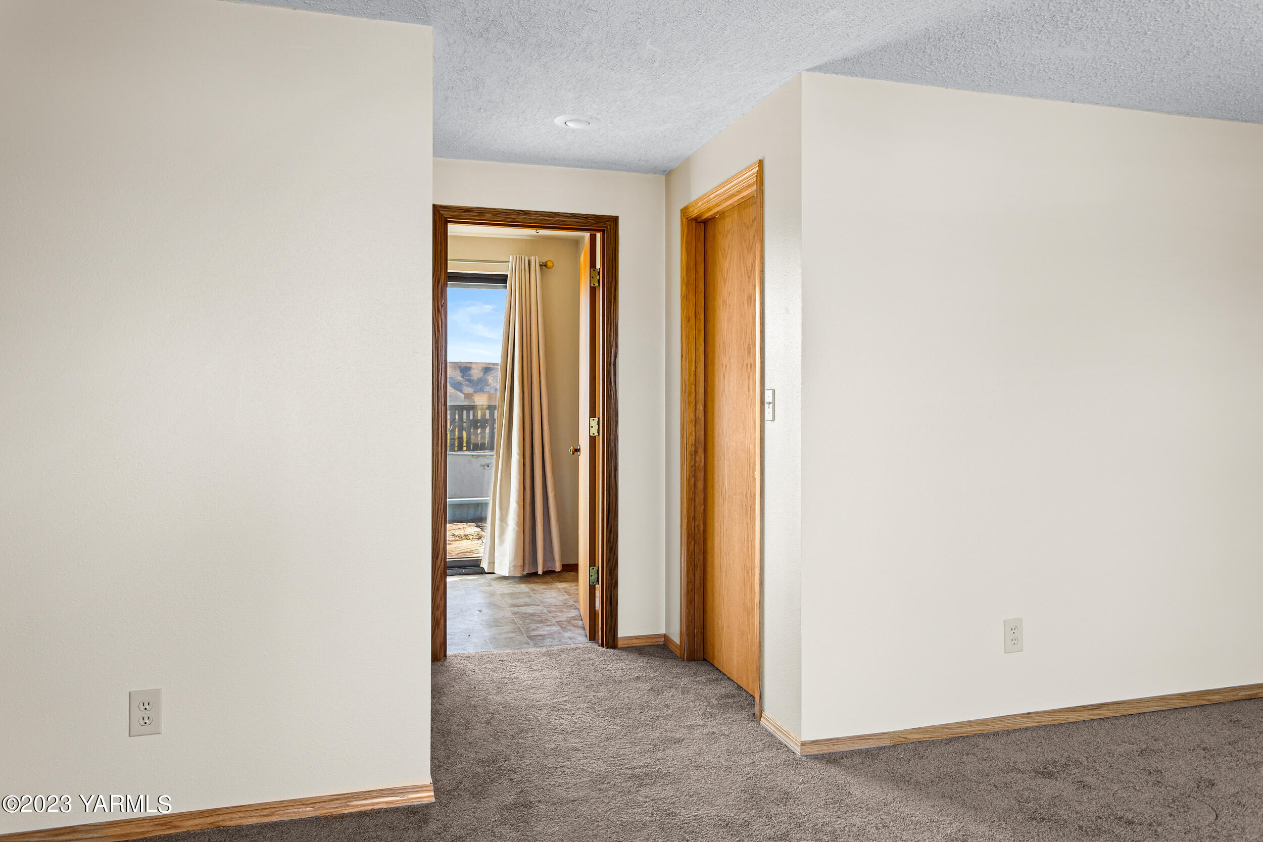 125 Johnson Road Selah, WA 98942 - Photo 16 of 36 a view of a room with a hallway