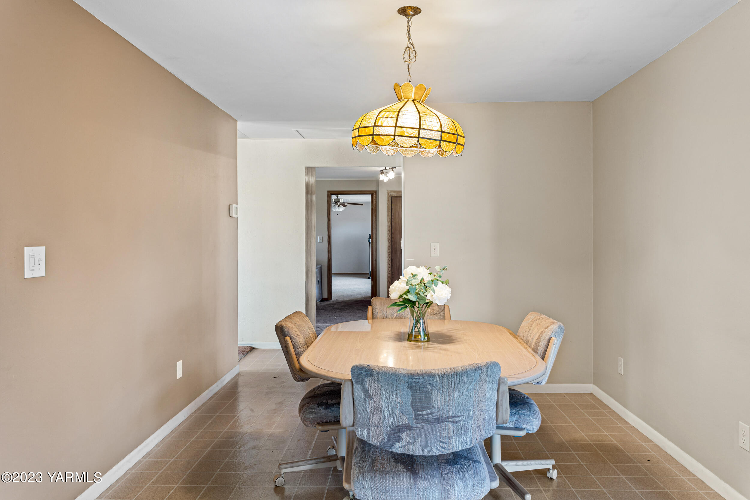 125 Johnson Road Selah, WA 98942 - Photo 6 of 36 a view of a dining room with a table and chairs