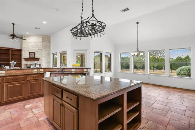 a view of an empty room with a large window