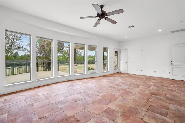 a spacious bathroom with a double vanity sink a mirror and a bathtub
