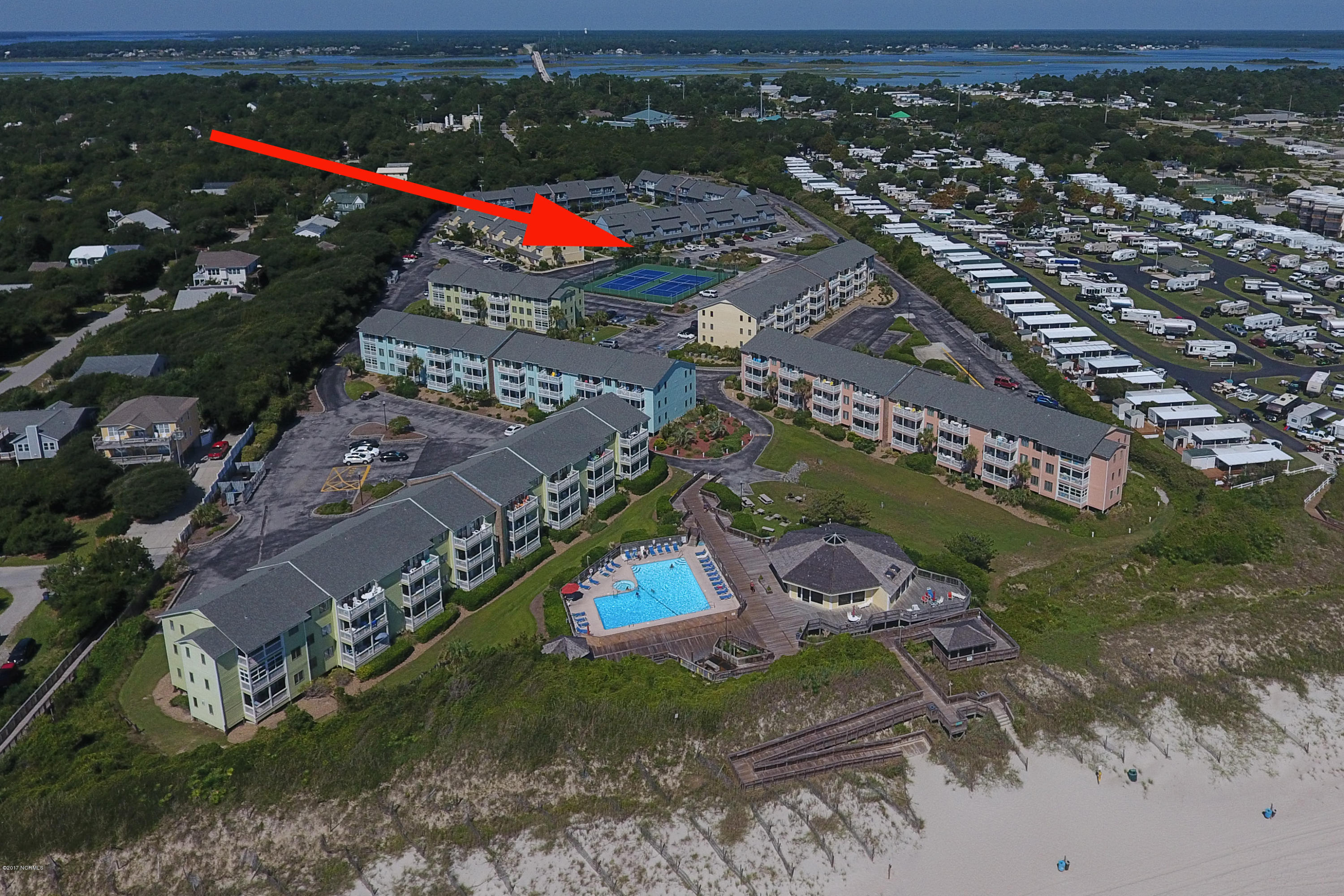 9201 Coast Guard Road, Unit I102 Emerald Isle, NC 28594 - Photo 2 of 24 PBI102-d-1arrow