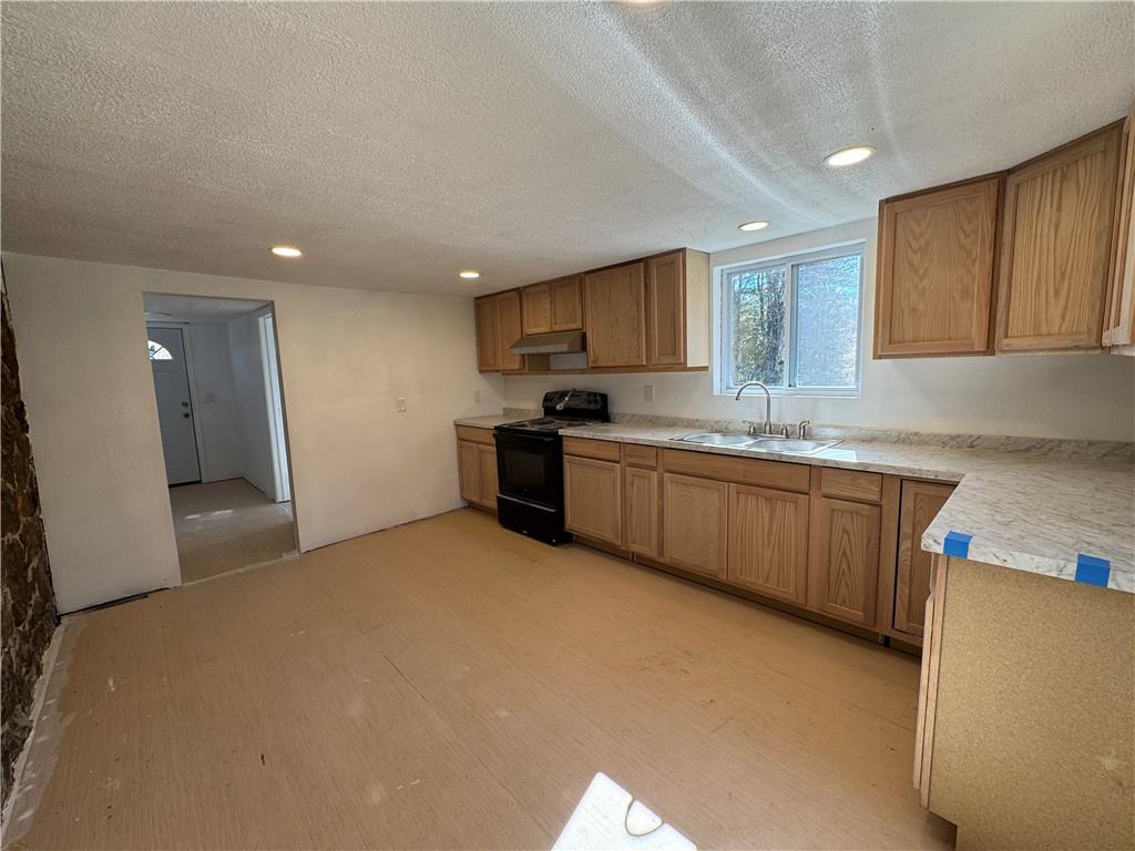 2505 Parkwood Road Shelocta, PA 15774 - Photo 3 of 19 a kitchen with stainless steel appliances granite countertop a sink stove and refrigerator