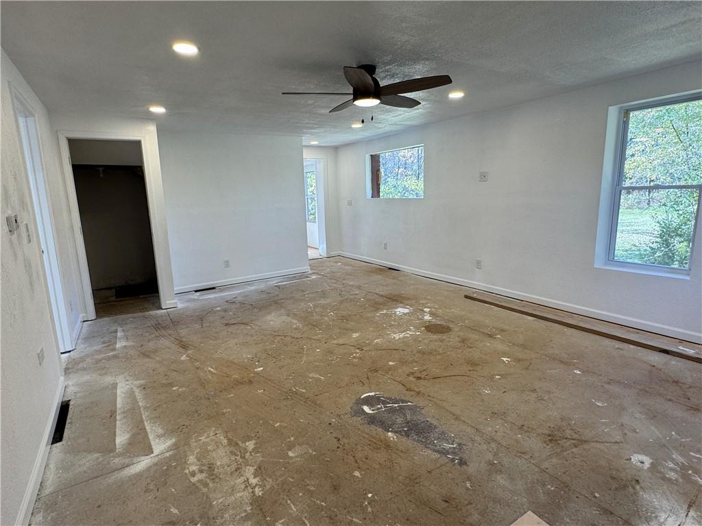 2505 Parkwood Road Shelocta, PA 15774 - Photo 7 of 19 an empty room with a ceiling fan and window