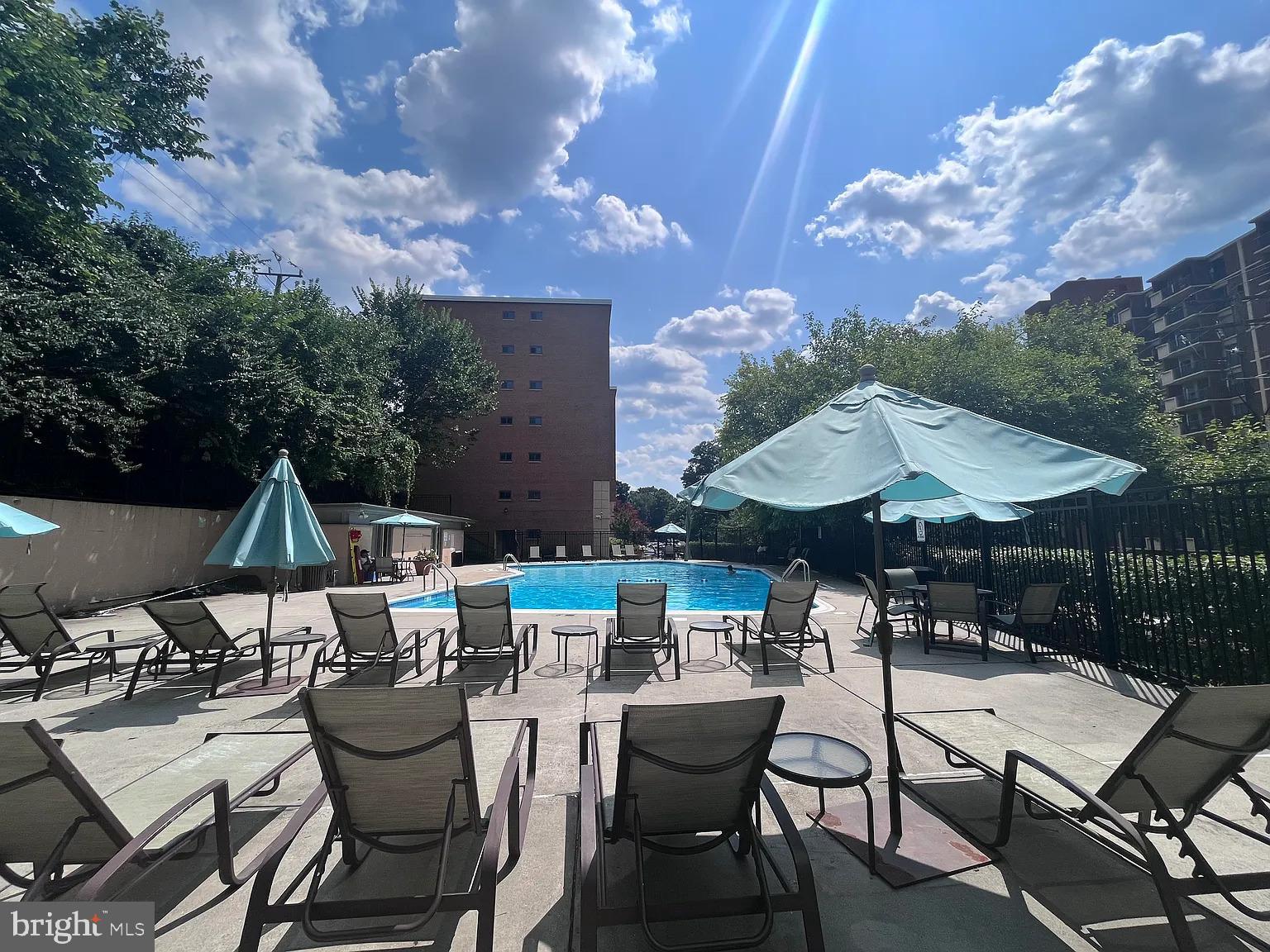 1200 South Arlington Road, Unit 504 Arlington, VA 22209 - Photo 16 of 20 a view of a patio with chairs and tables