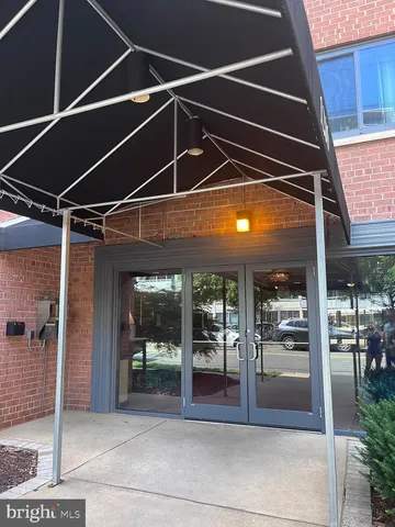 a view of a building with a garden